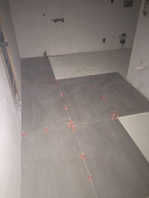 large tiles in small room